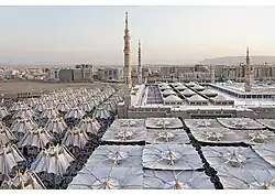 East side of the mosque, with some of the umbrellas partially closed