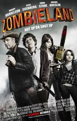 Poster for Zombieland with the tagline "Nut up or shut up" and movie credits: The four actors appear as a group all holding different weapons.